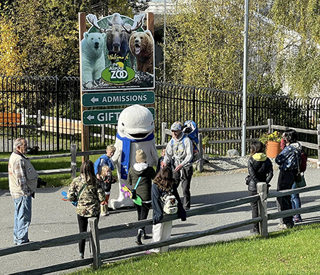 Betty Beluga welcomes visitors to the Alaska Zoo host of the afternoon Belugas Count celebration featuring educational activities and science talks from beluga experts