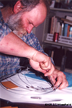 Biometrician Grey Pendleton works on a hair snare