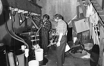 Snettisham Hatchery 1979 Shocking chum salmon eggs Left to right Jim Cochran Greg Young Jeff Hanson