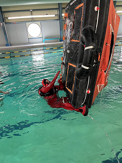 Righting a life raft in a pool exercise