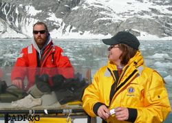John Wells operates the boat while Shawna Karpovich takes pictures on a seal capture and research trip in Glacier Bay Wells said they watched a Steller sea lion eat a harbor seal on this trip