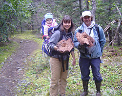 Author Carmen Field and her family with some prize Kenai Peninisula fungi