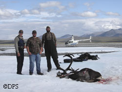 Trp Michael Potter checks caribou hunters