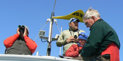 Researchers conduct a murrelet survey aboard the Gravina  Photo by Holly Hughes