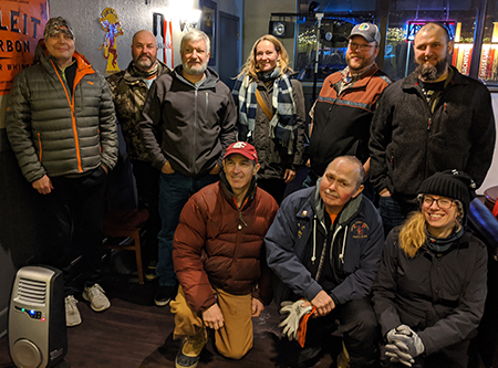 Members of the ADFampG dive team warm up at the end of the day