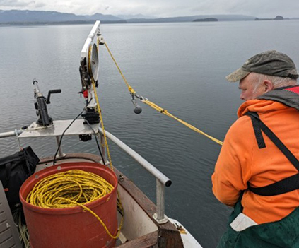 Mark on his boat with the tow line