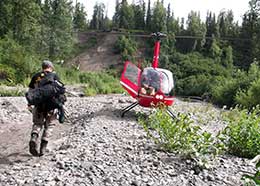 Loading up the helicopter for the flight out
