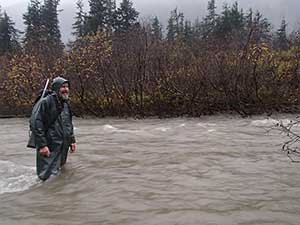 Leon in the swollen Berners River Photo by Scott Forbes