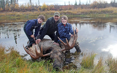 Mark Kufel and sons on a successful moose hunt Ken Marsh photo