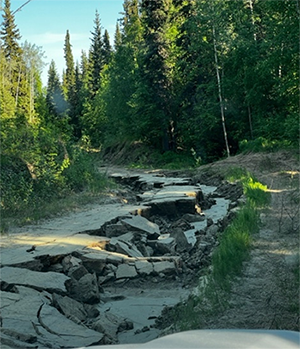 Cache Creek Road prior to reconstruction More than 1000 truckloads of gravel were brought in to repair and level the roadways