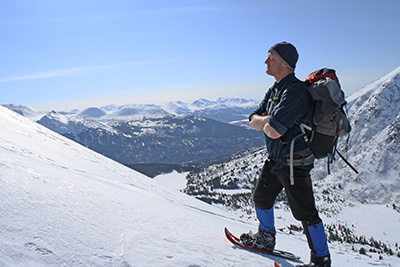 The snowshoeclad author basks in warm spring sunshine high above the Fuller Lakes 2012