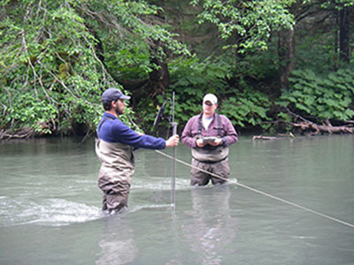 Jrod and Hassman measuring discharge at ADFampGrsquos Cowee Creek stream gage site ADFampG used data from this gage to get a water right to protect fish habitat migration and propagation in this important creek outtheroad from Juneau