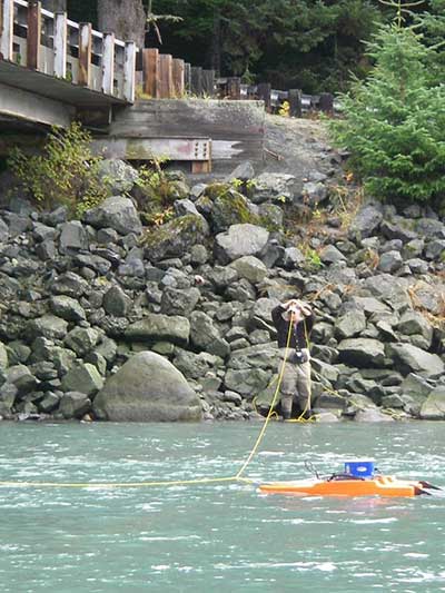 Hassman pulling an acoustic doppler current profiler across the Chilkoot River to measure discharge at ADFampGrsquos stream gage site ADFampG used data from this gage to get a water right to protect fish habitat migration and propagation in this popular river near Haines