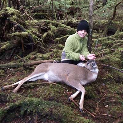 The author39s nephew John Auth with his first deer