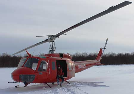 Yukon Helicopters owner Tom Ratledge and the big red bird