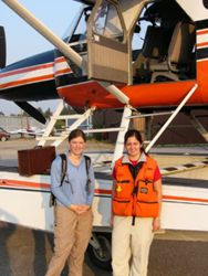 Kira Pontius and Jennifer Carroll REU intern getting ready to go out on Aerial Survey
