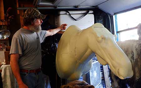 Taxidermist Jeff Kihlmire with a moose form The basic forms are modified in a variety of ways The skull plate with the antlers will be mounted on the head