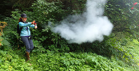 Practicing with a can of inert spray Photo by Riley Woodford