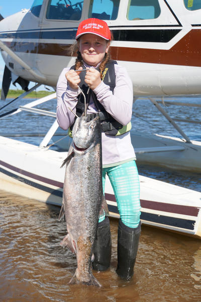 Brook Lentfer with a nice salmon on a flyin trip