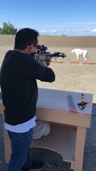 An Australian Hunter Ed administrator testing out crossbows and learning about Alaskarsquos crossbow education certification course