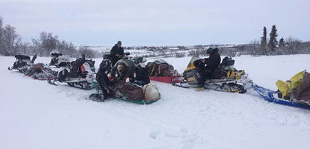 Hunters on snogo39s with sleds Photo by Patrick Jones