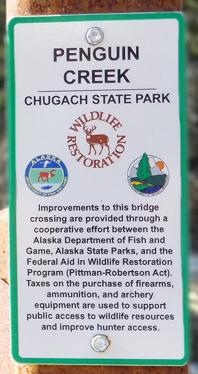 A short drive from Anchorage visitors to Penguin Creek may have noticed this sign on the new bridgeemem