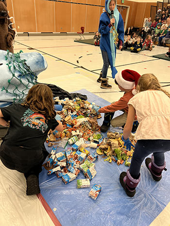 A waste audit and assembly with the kids participating in the Ocean Guardian Program at Auke Bay Elementary School in Juneau Thunder Mountain High School and Sayeik Gastineau in Juneau were the very first two schools to be official Ocean Guardian Schools in Alaska Photo courtesy Kim RaumSuryan
