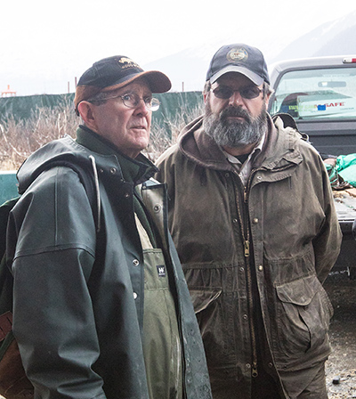 Bruning with David James in 2015 preparing to transport wood bison from AWCC to Shageluk At the time James was the supervisor for Region 3 and encouraged Bruning to serve in the position