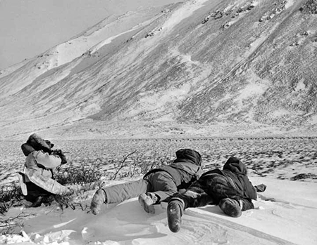 Men hunting caribou in Anaktuvuk Pass Alaska with caribou herd in distance in 1962 Ward Wells Collection Anchorage Museum B1983091S3421073