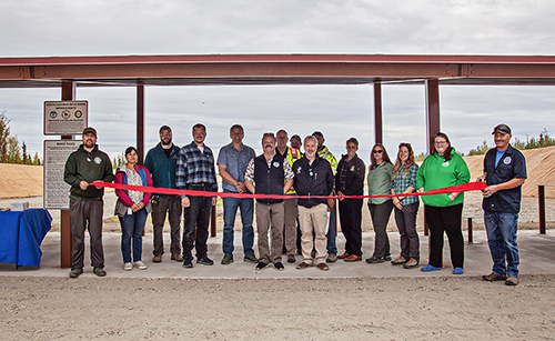 Repesentatives of groups involved in the range reconstruction attend the range reopening these groups include ADFampG the Fairbanks North Star Borough USFWS and the contractors
