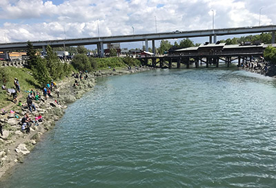 Anglers line the banks at Ship Creek in downtown Anchorage Photo by ADFampG staff