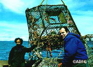Captain Gary Edwards with quotghostquot pot full of crabs octopus and misc marine organisms