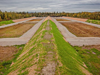 Looking from the improved taller end berm back at the rifle range firing line after construction Photo credit FNSB